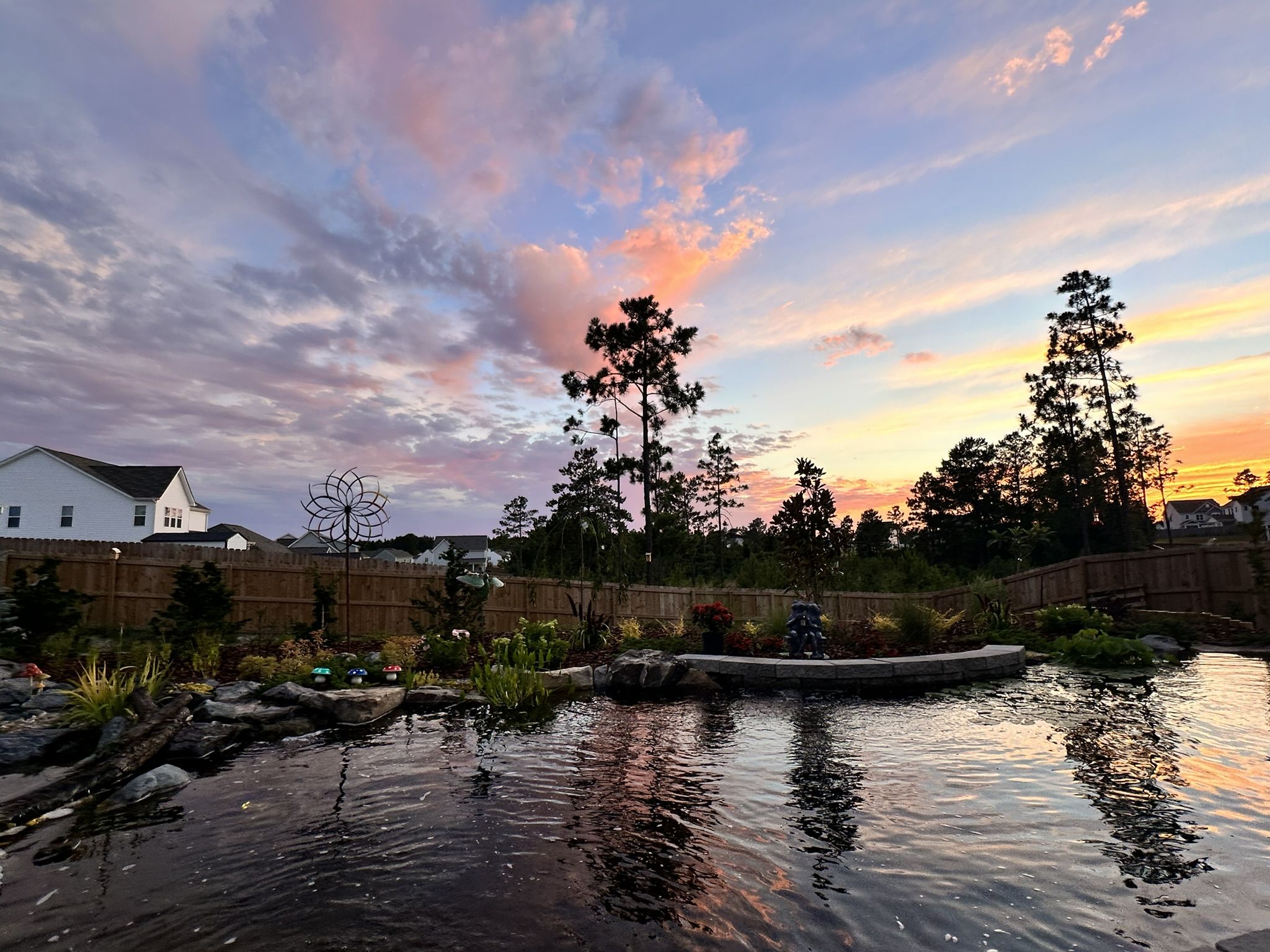 Sunset over a custom Carolina Water Gardens koi pond